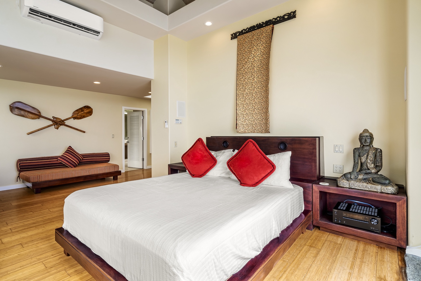 Kailua Kona Vacation Rentals, Ali'i Point #12 - Primary bedroom features a king bed, plush linens, and serene coastal decor for restful nights.