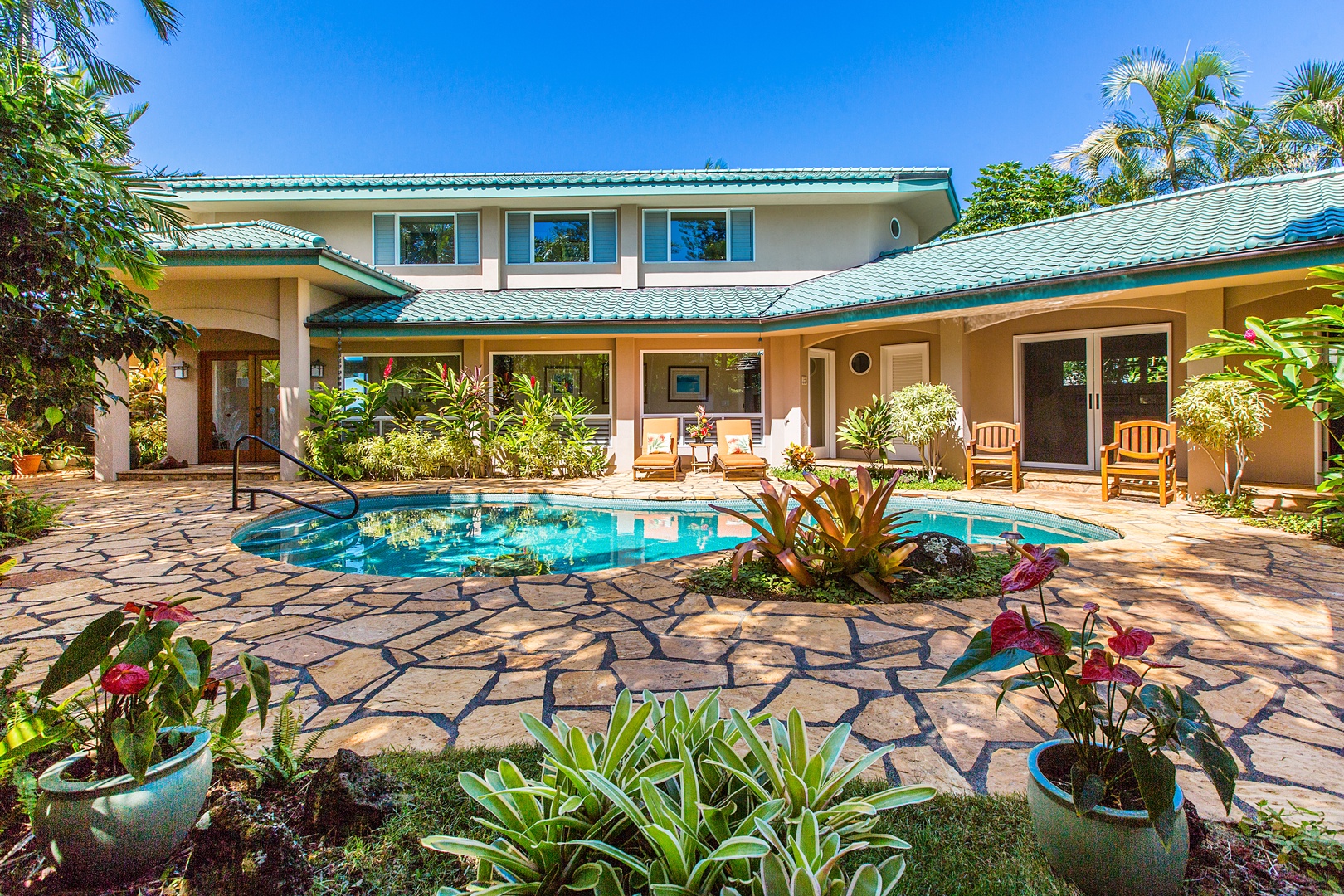 Princeville Vacation Rentals, Honu Awa - The private courtyard contains a lovely lagoon-style pool, where you can relax in scenic tranquility