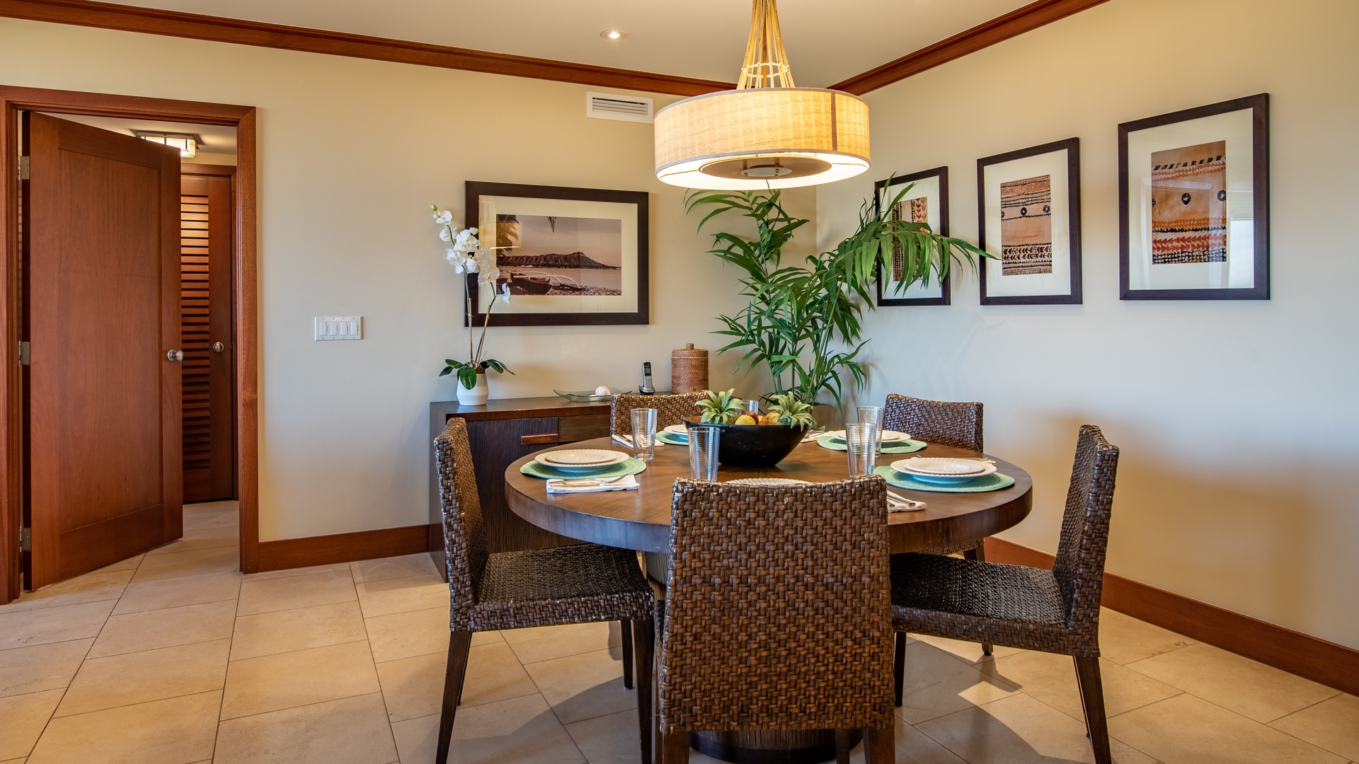 Kapolei Vacation Rentals, Ko Olina Beach Villas B505 - Dine under boutique lighting and framed art.