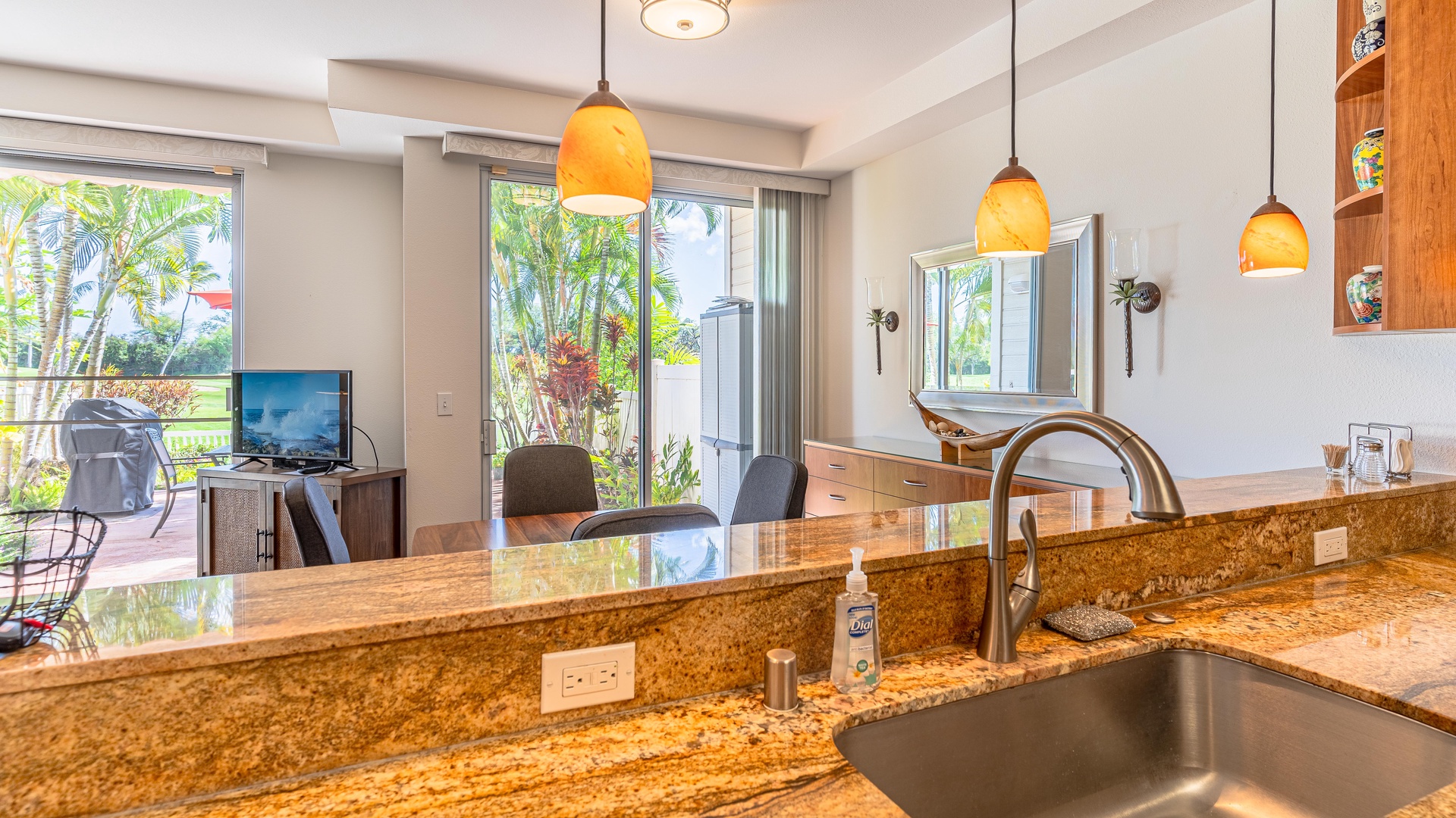 Kapolei Vacation Rentals, Fairways at Ko Olina 20G - Dine with a view and converse with the chef in an open floor plan.
