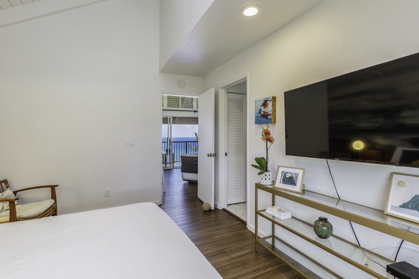 Princeville Vacation Rentals, Pali Ke Kua 207 - The primary bedroom also boasts a new smart TV for winding down after a day of adventure