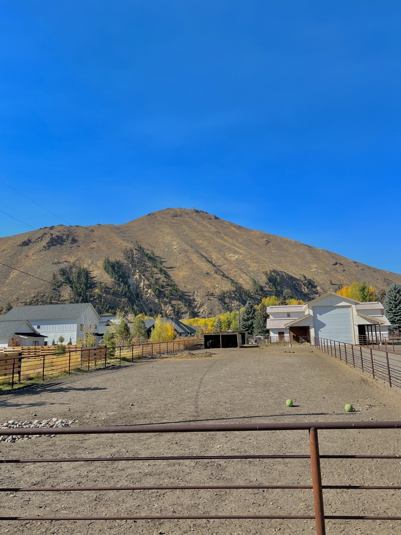 Triumph Vacation Rentals, Contemporary Red Feather Comfort - horse boarding facility that bumps right up to the backyard of the home, a quintessential Idaho touch