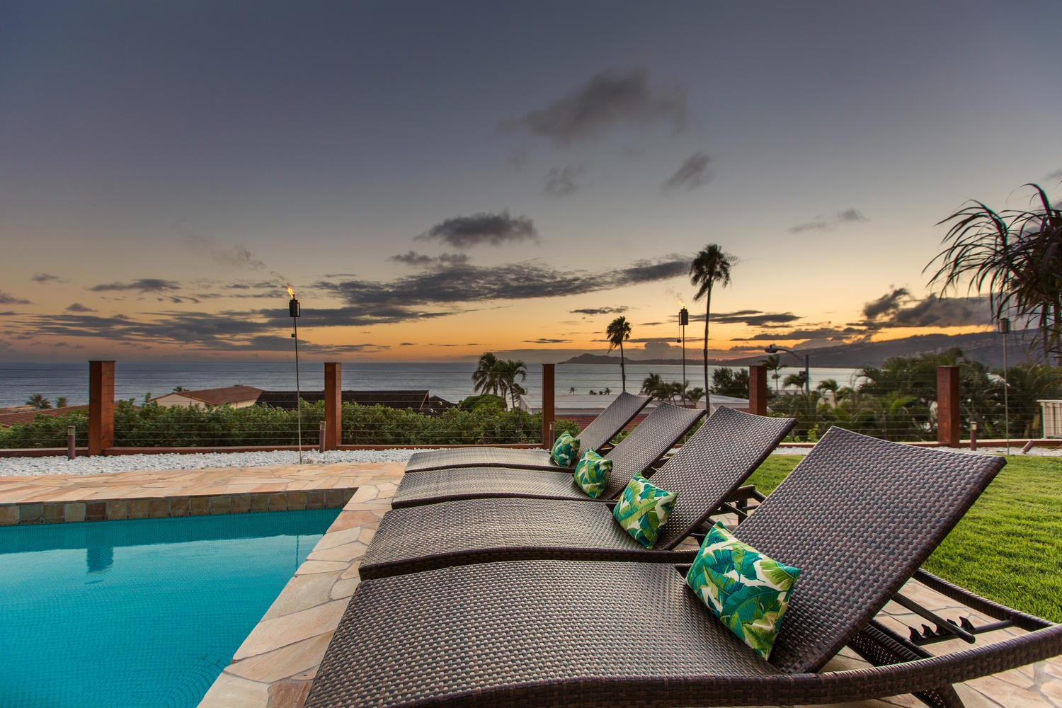Honolulu Vacation Rentals, Aloha Nalu - Poolside bliss awaits, with chaise lounges ready for your retreat.