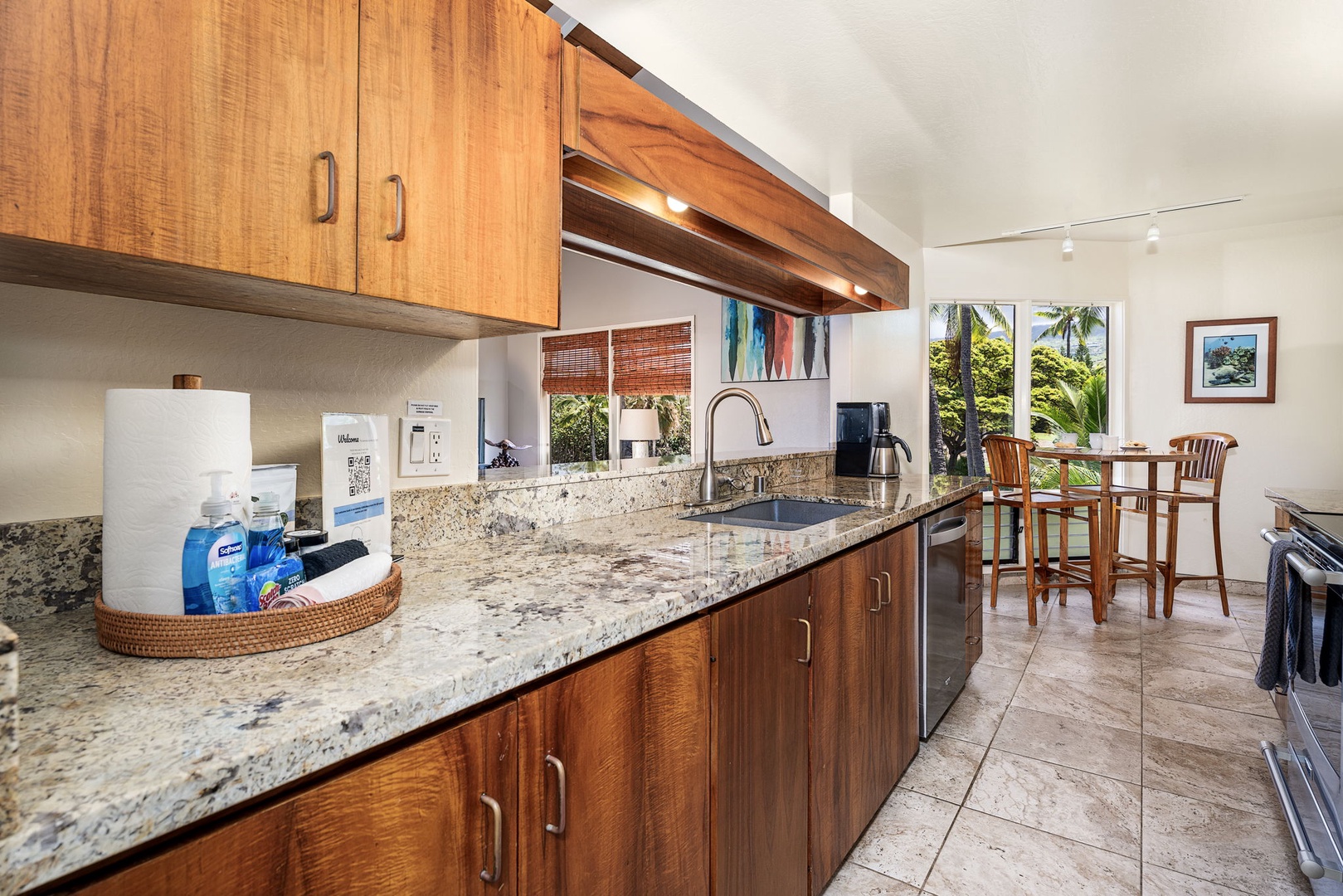 Kailua Kona Vacation Rentals, Kanaloa at Kona 1606 - Pull up a stool at the breakfast bar while dinner comes together behind you.
