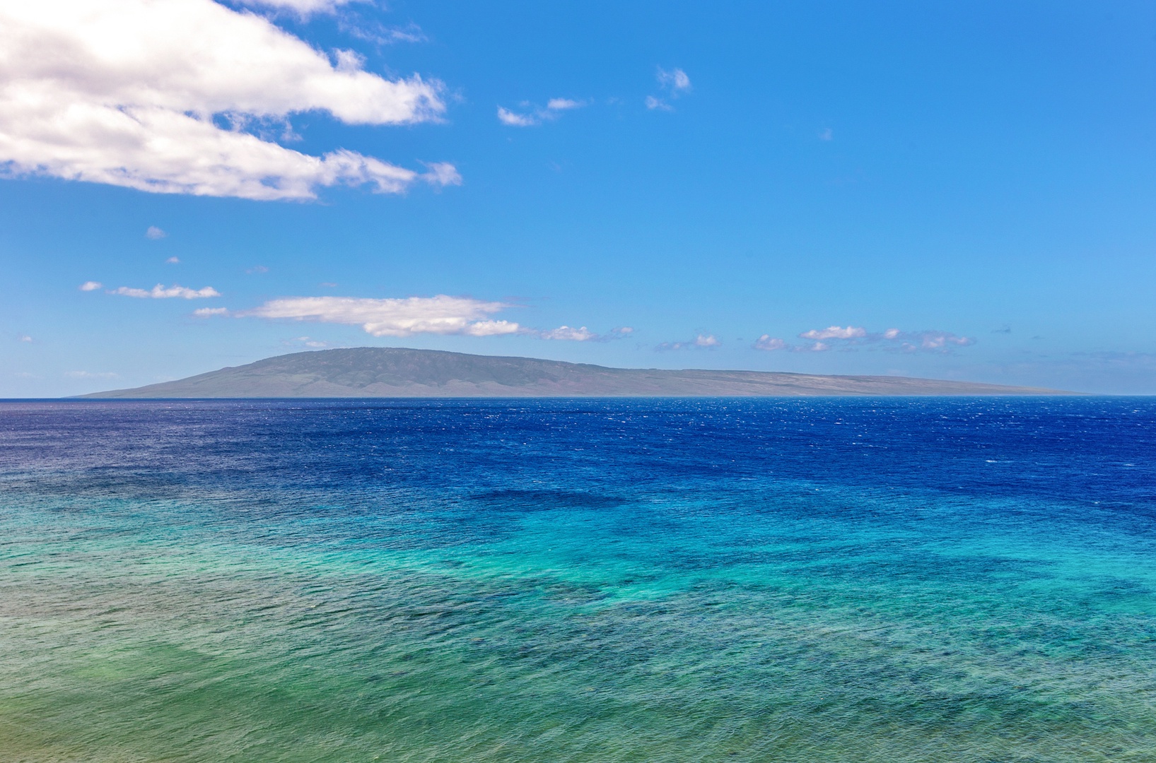 Lahaina Vacation Rentals, Mahana 1119 - Breathtaking ocean views with clear blue skies and distant islands.