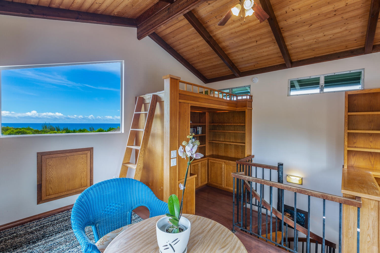 Princeville Vacation Rentals, Hale Ohia - Up the spiral staircase, you'll find Guest Bedroom 3 with a lofted twin bed and play area for the kids