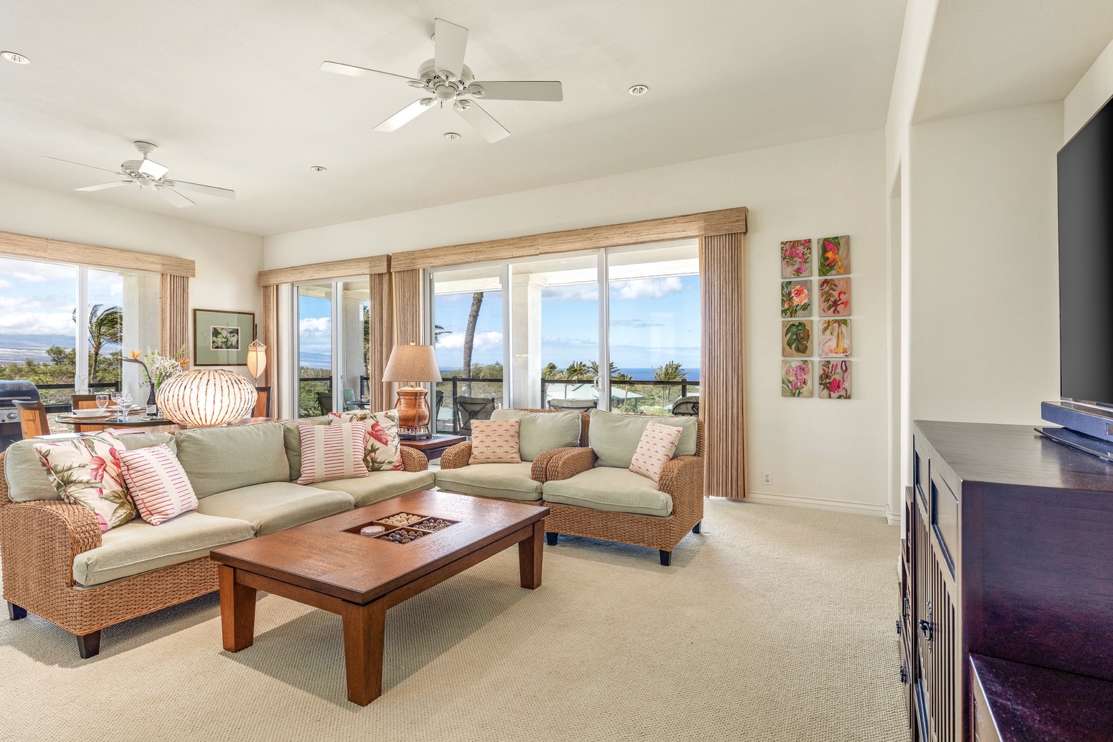 Kamuela Vacation Rentals, 2BD Kumulani (I-4) at Mauna Kea Resort - Alternate view of living area showcasing beautiful natural light and sliding doors
to lanai.