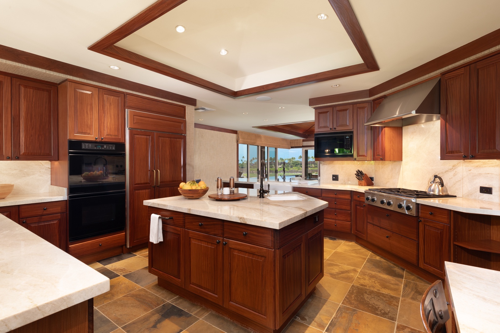 Kailua Kona Vacation Rentals, 5BD Ke Alaula Estate (144) at Hualalai Resort - Central island and tray ceiling highlight this chef-ready kitchen.