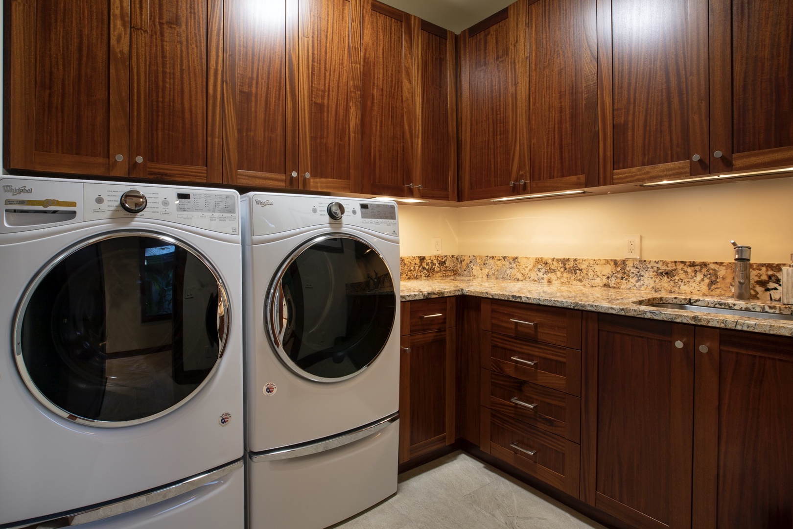 Kailua Kona Vacation Rentals, 4BD Kulanakauhale Estate (3558) at Hualalai Resort - Dedicated laundry room with oversized Whirlpool washer and dryer, sink and ample counter prep space.