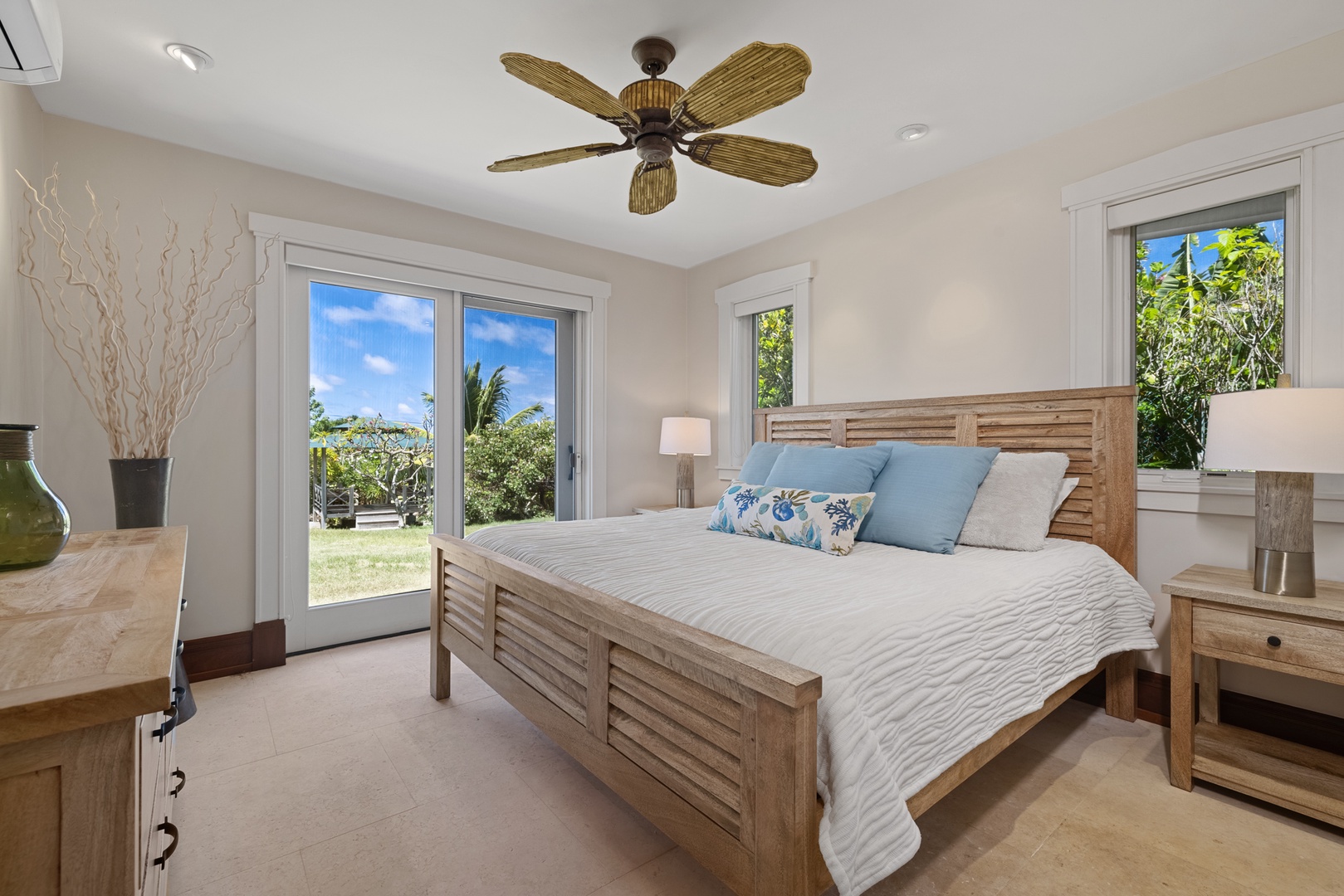 Kailua Vacation Rentals, Leaf House - The downstairs guest bedroom four features a king-sized bed and lanai.