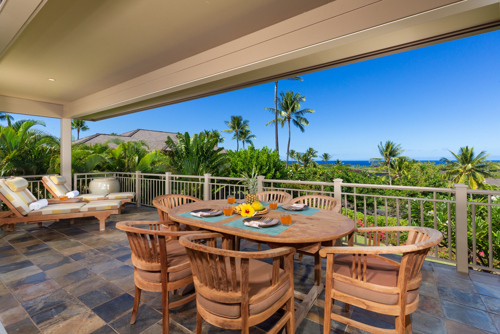Kailua Kona Vacation Rentals, 3BD Ke Alaula Villa (210A) at Four Seasons Resort at Hualalai - Wide view of exterior dining table toward chaise loungers