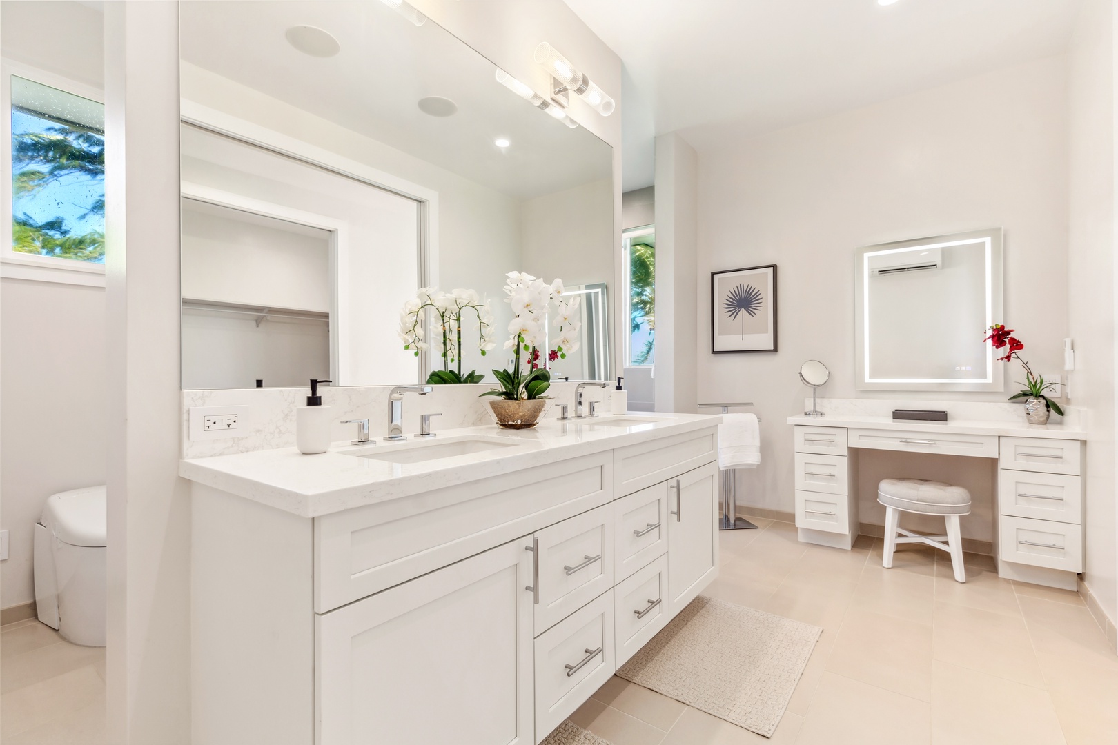 Laie Vacation Rentals, Majestic Mahakea Oceanfront Oasis - Bathroom with ample counter space and luxurious touches for a serene morning routine.