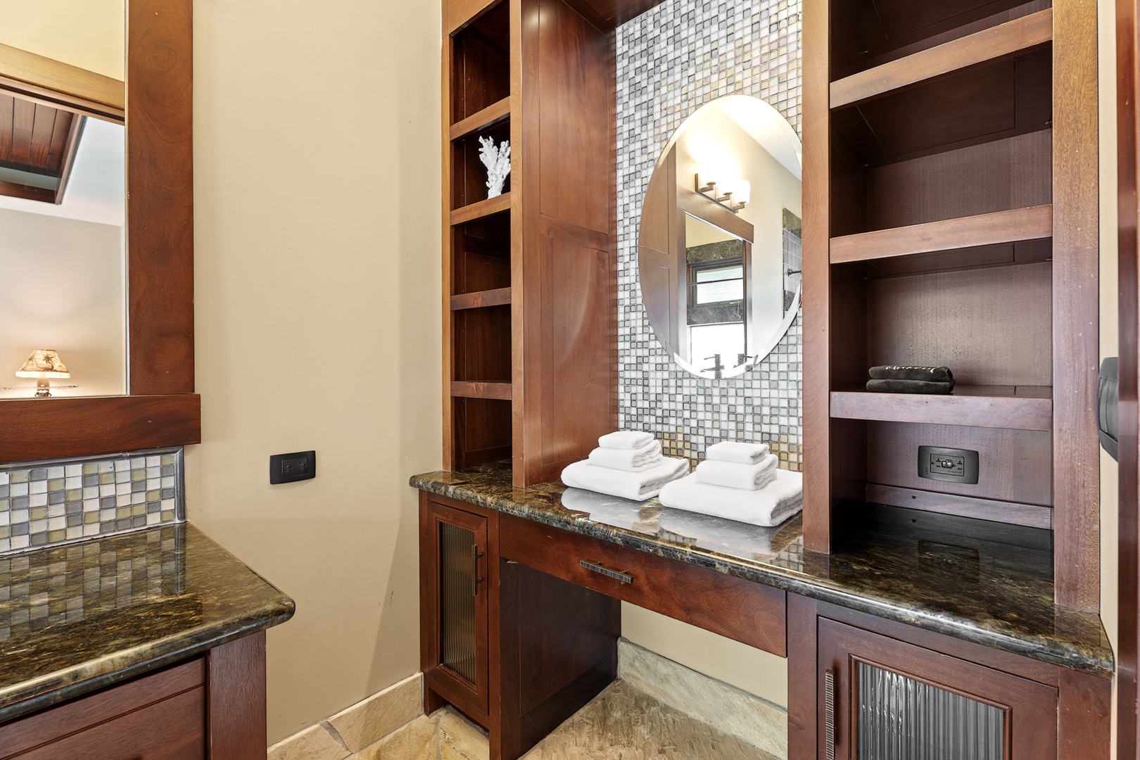 Kamuela Vacation Rentals, Hale Konane - Thoughtfully designed vanity area with custom wood cabinetry and ample storage for your essentials.