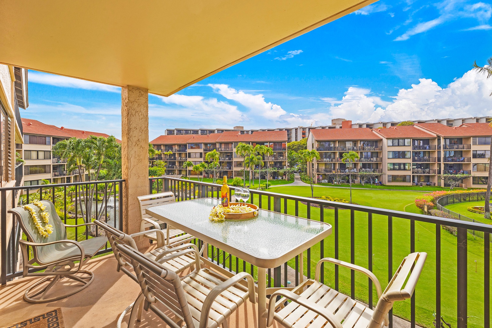 Lahaina Vacation Rentals, Papakea G-306 - The private lanai offers a perfect spot to enjoy outdoor dining with views of the lush grounds and tropical surroundings.