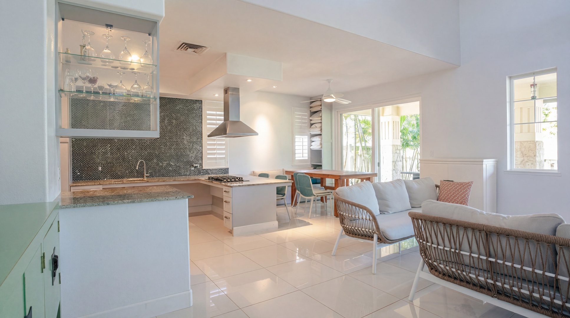Open floor plan, so whoever is cooking still catches every story from the living room.