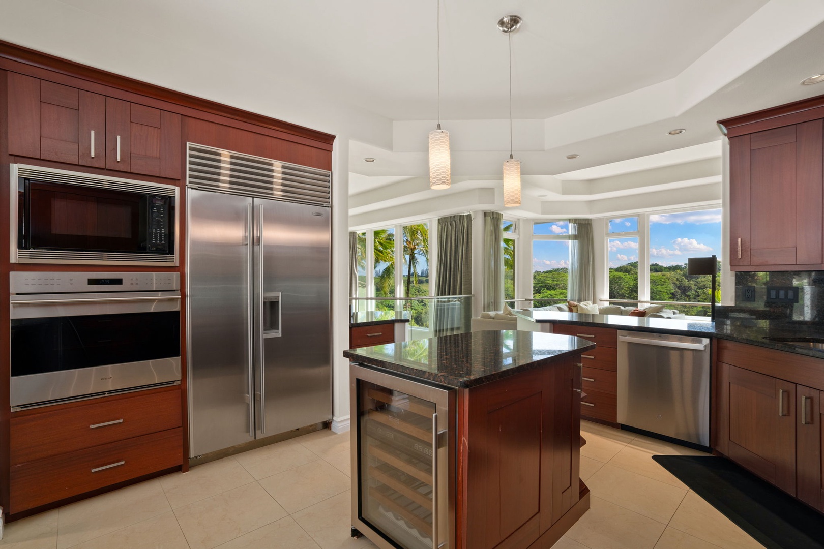 Princeville Vacation Rentals, Kaiulani #8 - Double wall ovens and a full-height refrigerator for nights when everyone stays in to eat.