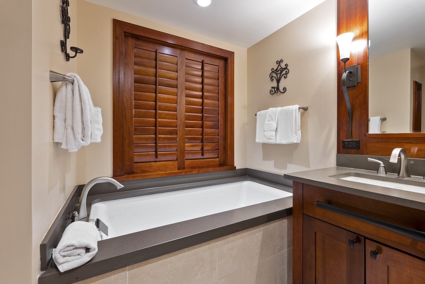 Kapolei Vacation Rentals, Ko Olina Beach Villas O1404 - A deep soaking tub behind the shutters, the reward at the end of a beach day.