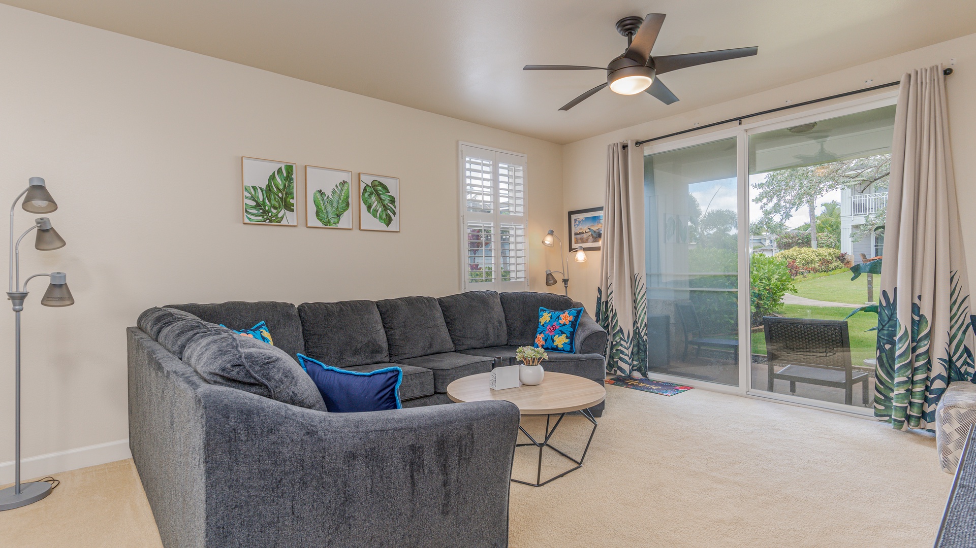 Kapolei Vacation Rentals, Ko Olina Kai 1027A - Sink in to the plush living room furniture and start a game night.
