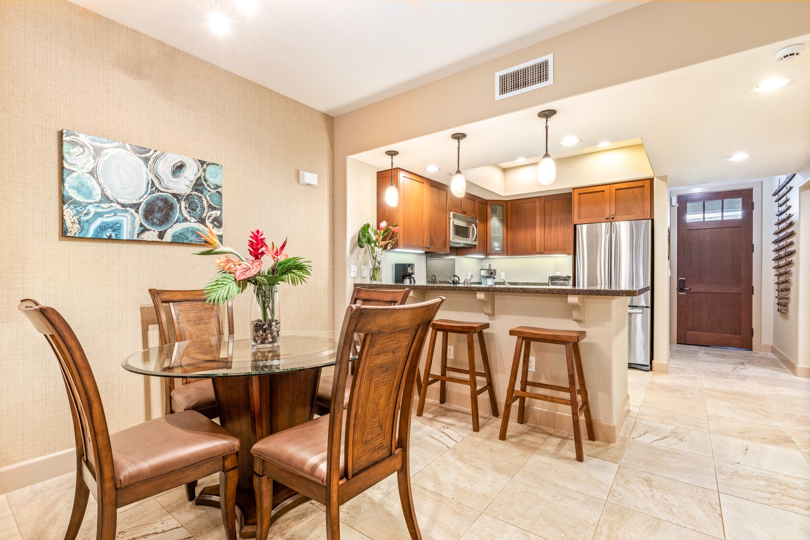 Waikoloa Vacation Rentals, 2BD Hali'i Kai (12C) at Waikoloa Resort - Wide view of dining area into kitchen.