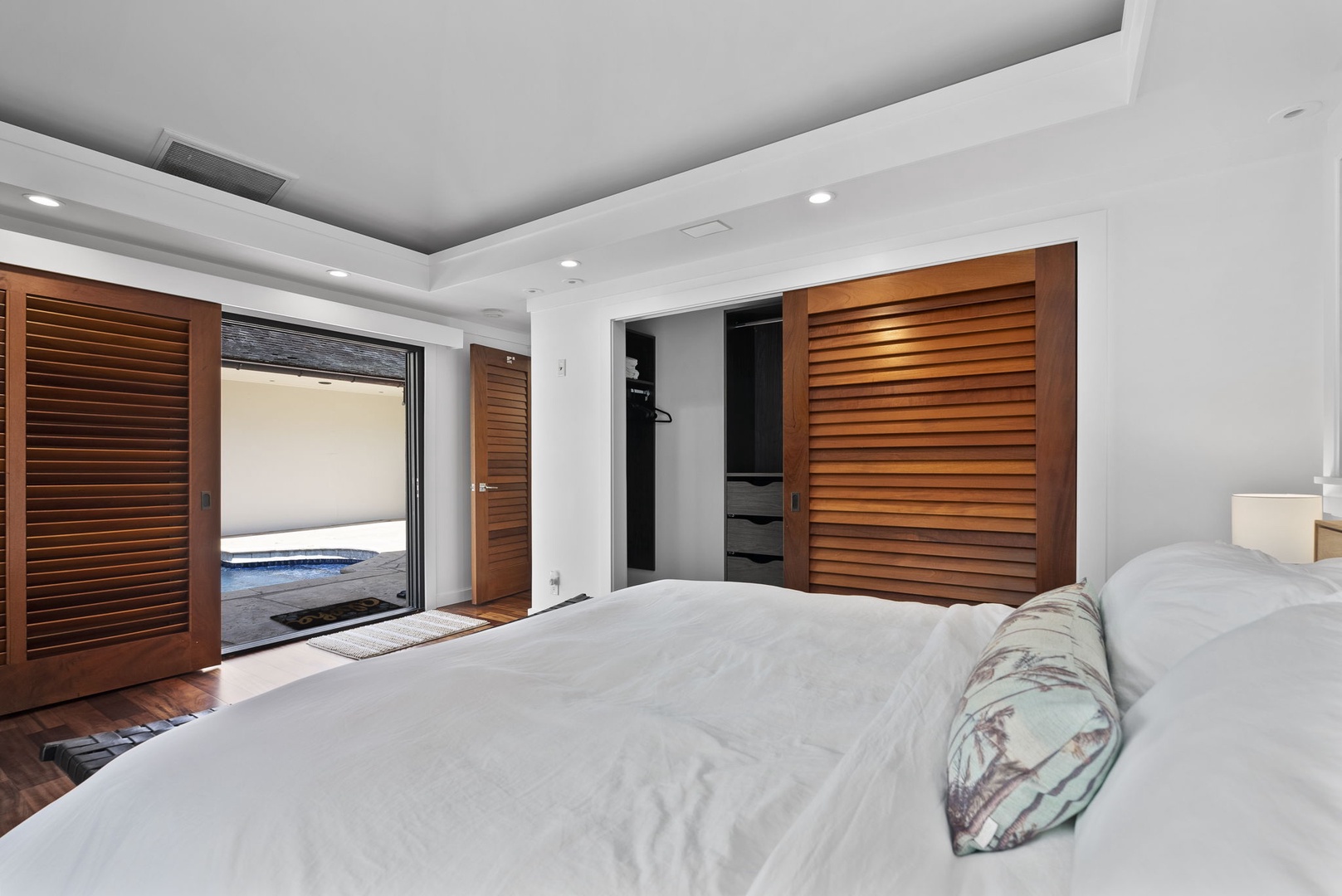 Honolulu Vacation Rentals, The Lagoon House 3BR - Serene bedroom with wood shutters and easy access to outdoor space.