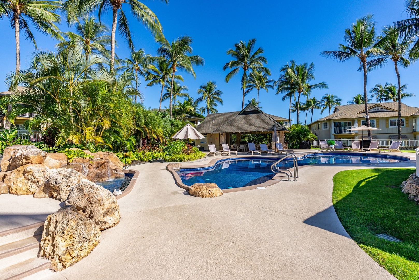 Kapolei Vacation Rentals, Kai Lani Luxury 6D - Sparkling pool with surrounding palm trees, ideal for a refreshing swim or lounging in the Hawaiian sun.