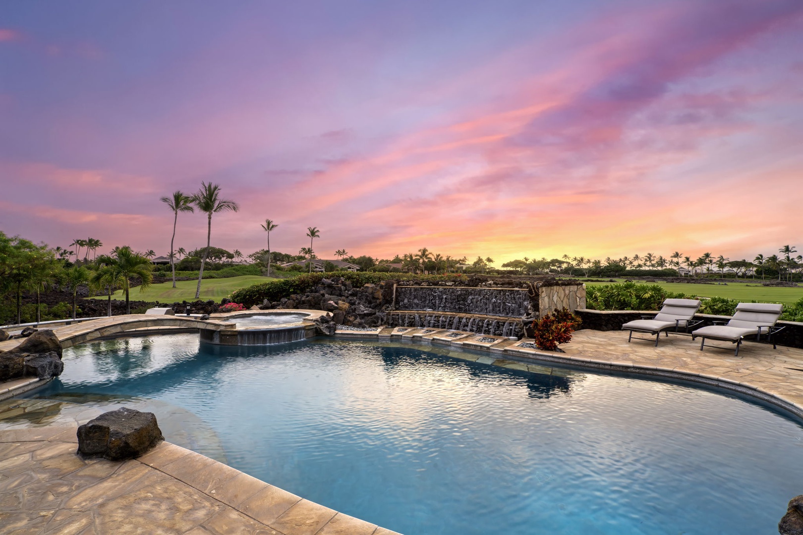 Kamuela Vacation Rentals, Hale Konane - Evenings are unforgettable by the pool, surrounded by lava rock and glowing skies.