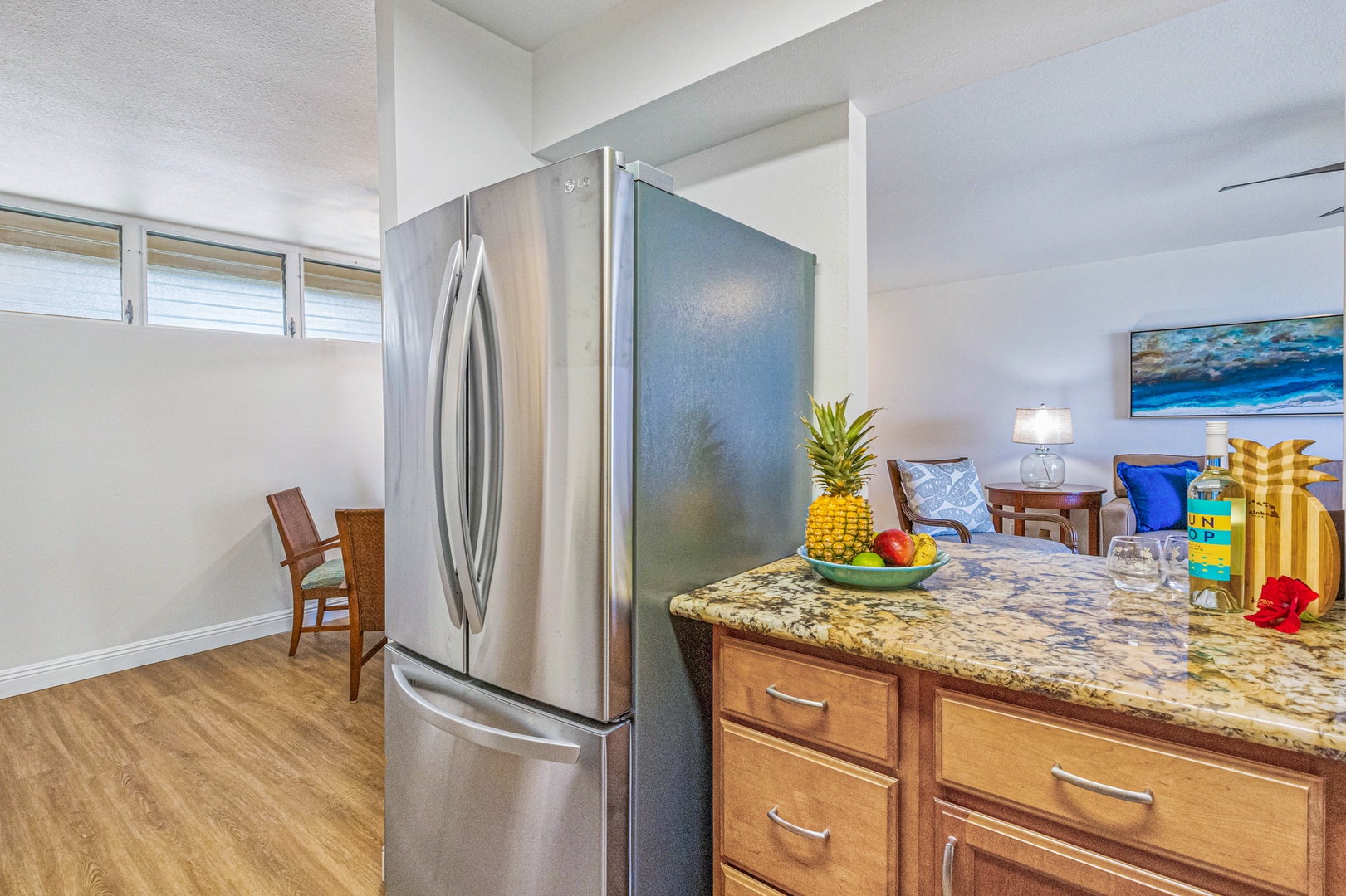 Lahaina Vacation Rentals, Royal Kahana 213 - Spacious stainless steel refrigerator and granite countertops, providing ample space for meal prep and storage during your stay.