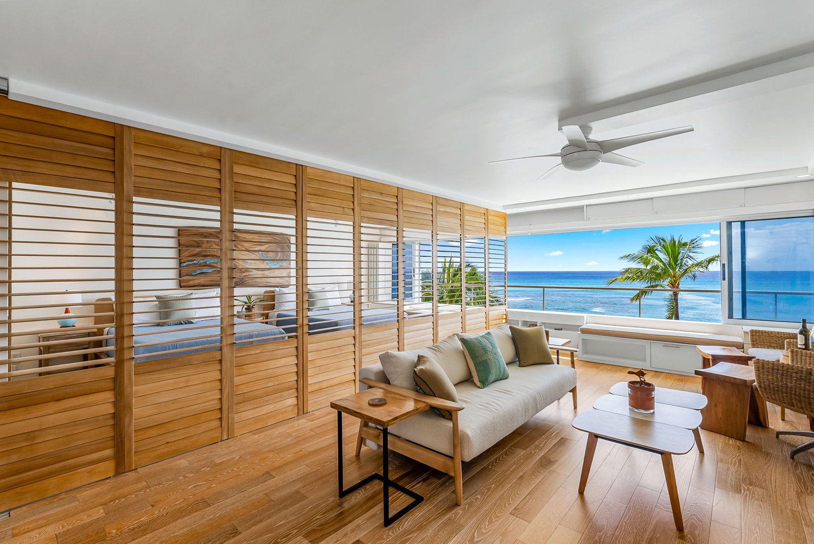 Honolulu Vacation Rentals, Colony Surf Luxe - A sliding wood wall allows the bedroom space to be separated from the living room.