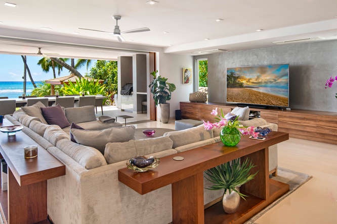 Honolulu Vacation Rentals, Diamond Head Beachfront Estate - Media lounge with large TV and sectional—ideal for movie nights or relaxed afternoons.