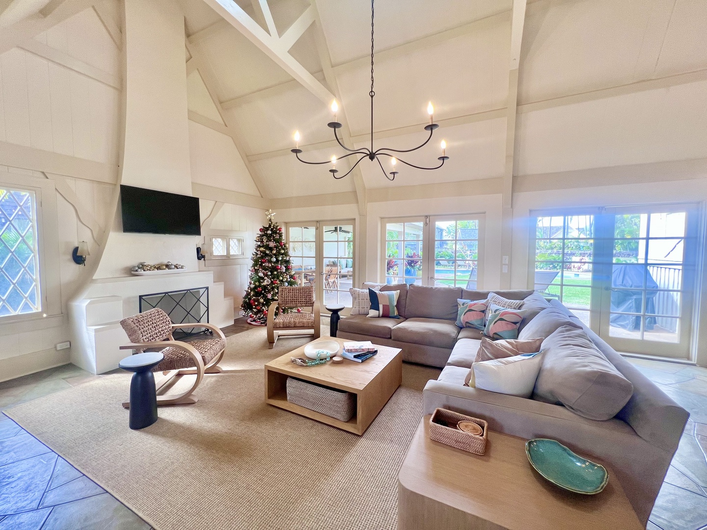 Honolulu Vacation Rentals, Kahala Palms - A cozy and spacious living room with vaulted ceilings, plush seating, and abundant natural light, ideal for relaxing with family and friends