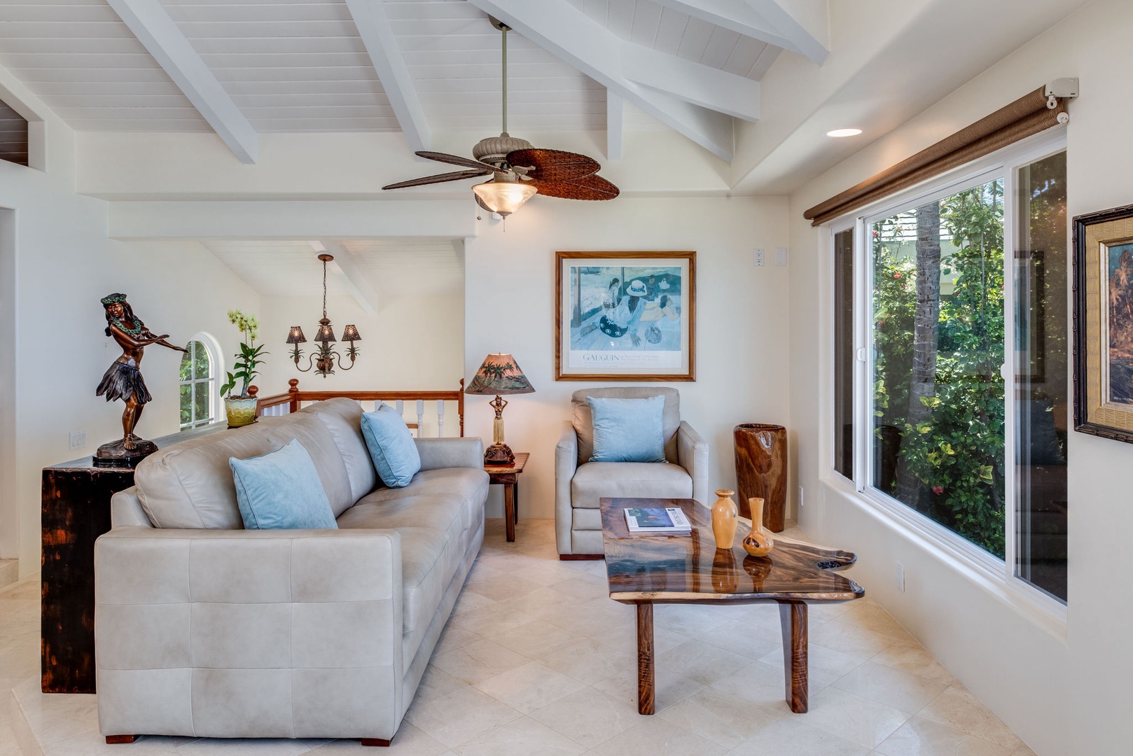 Kailua Kona Vacation Rentals, Kona Beach Bungalows** - Unwind in the serene ambiance of the Lihikai lounge area.