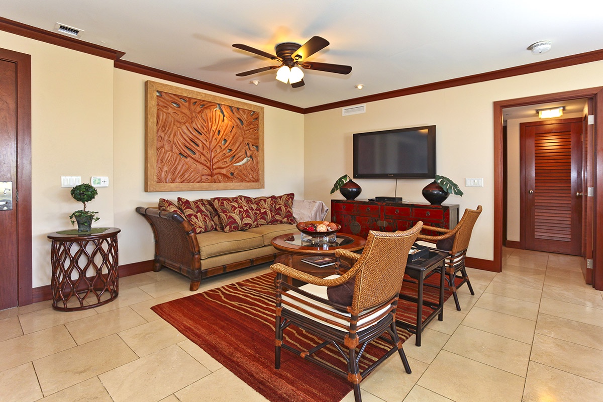 Kapolei Vacation Rentals, Ko Olina Beach Villas B103 - The beautifully decorated living area with TV.