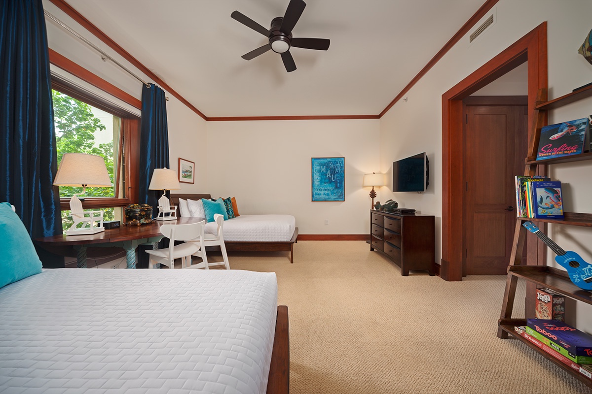 Kapalua Vacation Rentals, Ocean Dreams Villa 2203 at Montage Kapalua Bay* - Bedroom Three with 2 Full/Double Beds with Deluxe Mattresses, iPod Dock, CD/DVD, Leather Rocking/Reclining Chair, Drop-Down Play Table and Ottoman For Youngsters. Some games and books provided.