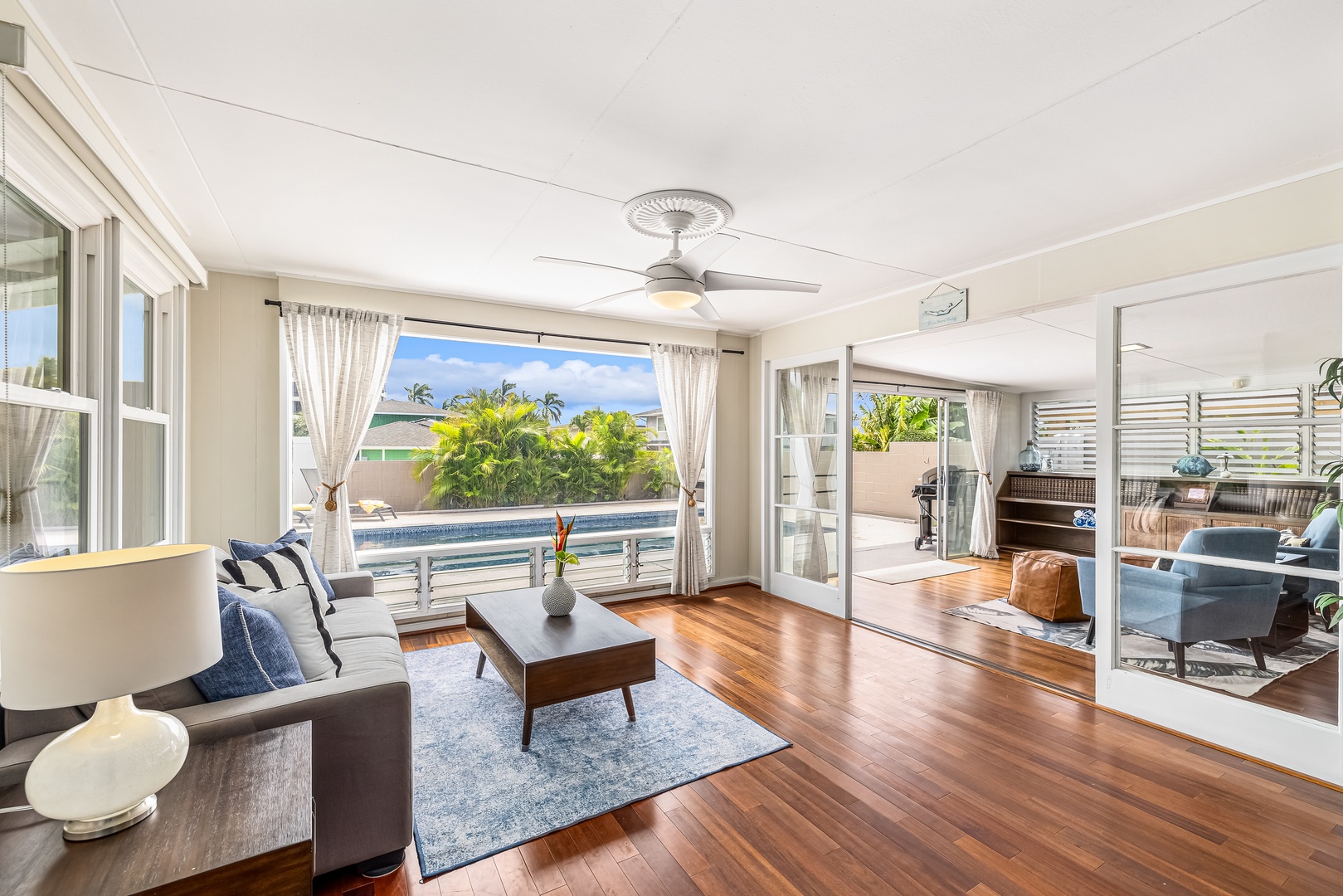 Honolulu Vacation Rentals, Kahala Cottage - Enjoy the morning views on the front living room with pool view.