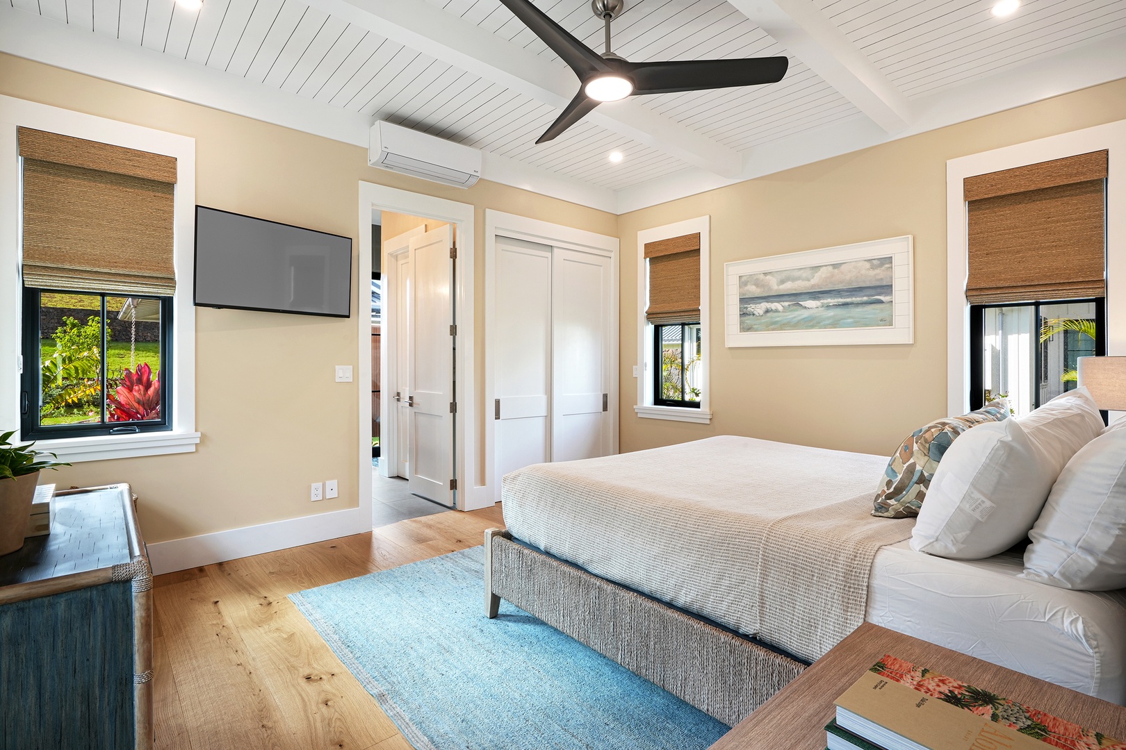 Koloa Vacation Rentals, Hali'a Mai - A second bedroom keeps it calm and coastal, bed angled toward the light from the lanai door.
