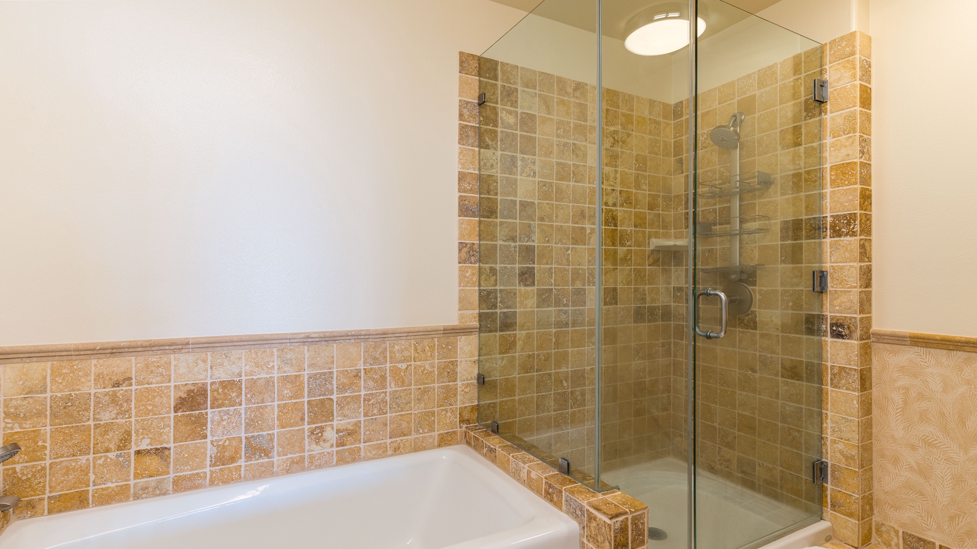 Kapolei Vacation Rentals, Kai Lani 21C - The primary guest bathroom has a shower and tub combination.