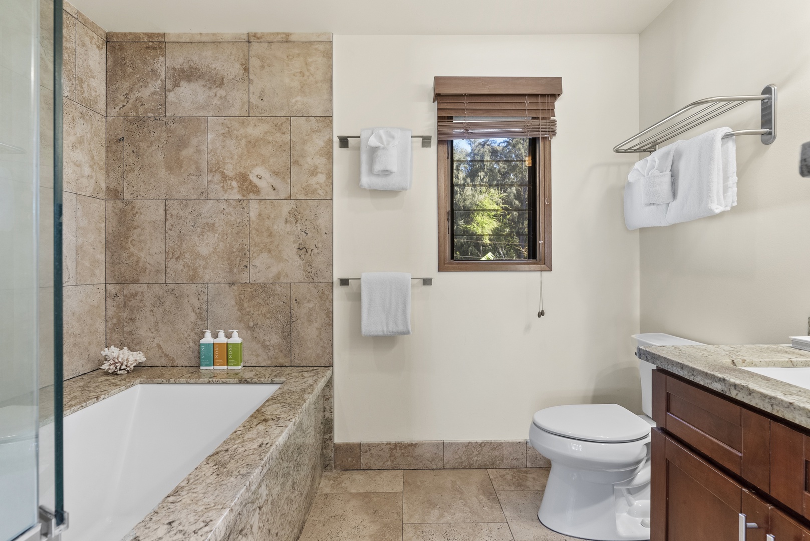 Haleiwa Vacation Rentals, Maluhia Beach House - Elegant bathroom featuring a deep soaking tub for a spa-like retreat.