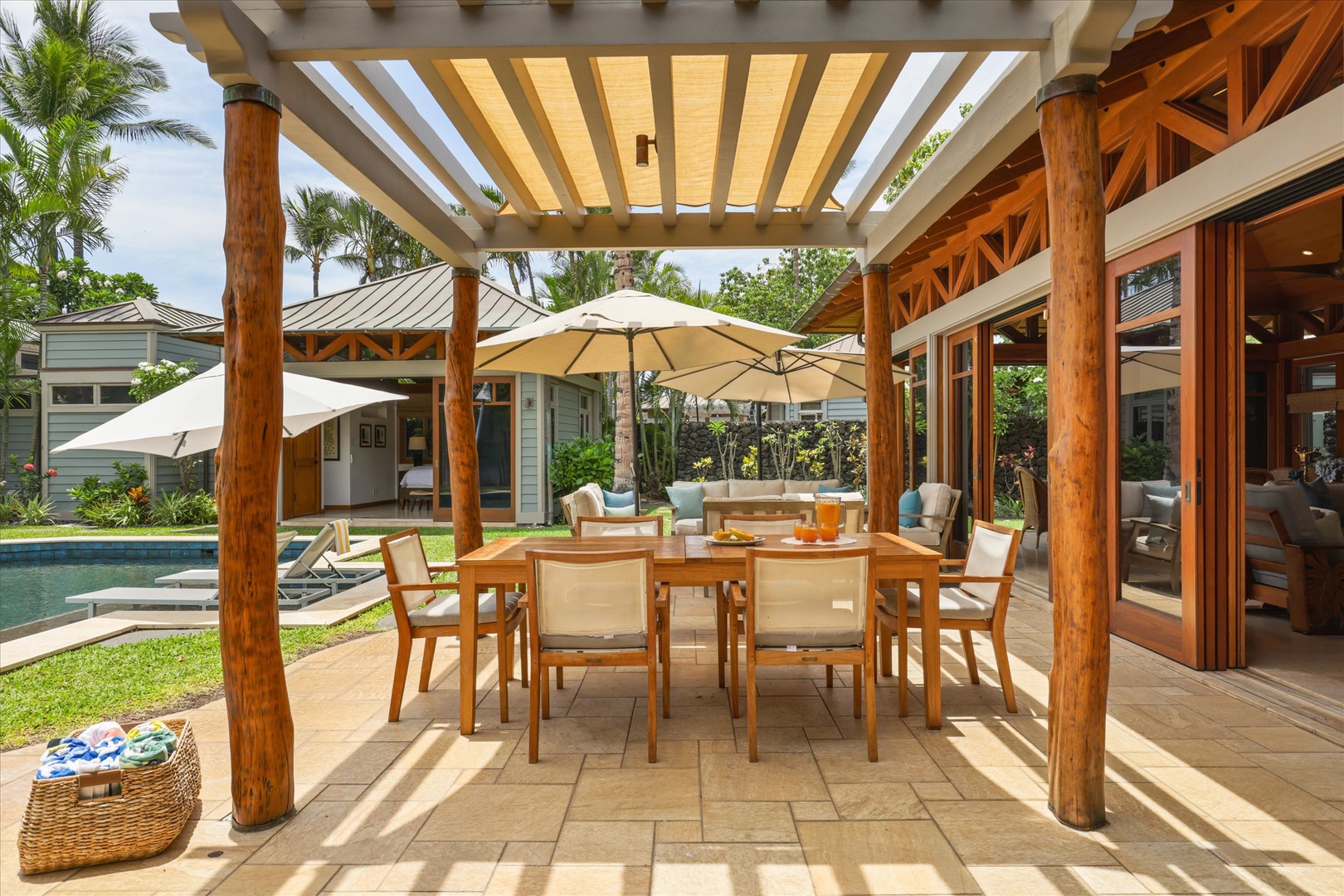 Kamuela Vacation Rentals, 3BD Na Hale 3 at Pauoa Beach Club at Mauna Lani Resort - Take lunch at the shaded outdoor table with the pool just beyond.