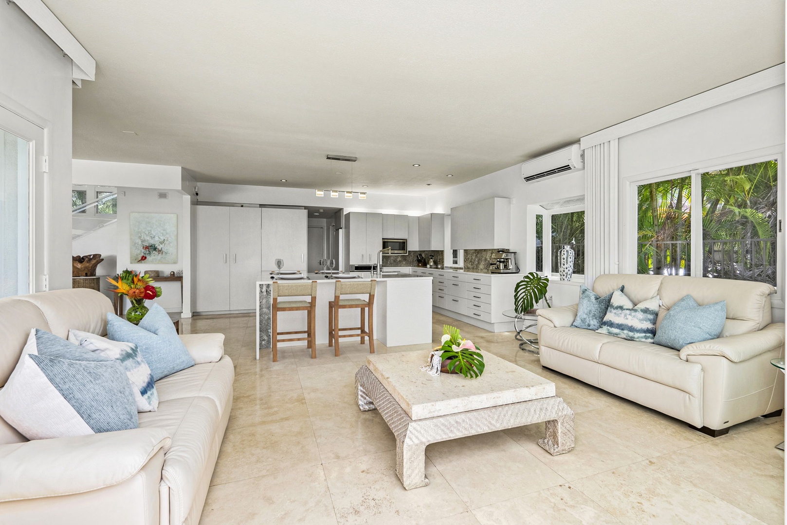Honolulu Vacation Rentals, Paradise Beach Estate - The heart of the home offers seamless flow from the kitchen to lounging and dining—ideal for entertaining with elegance.