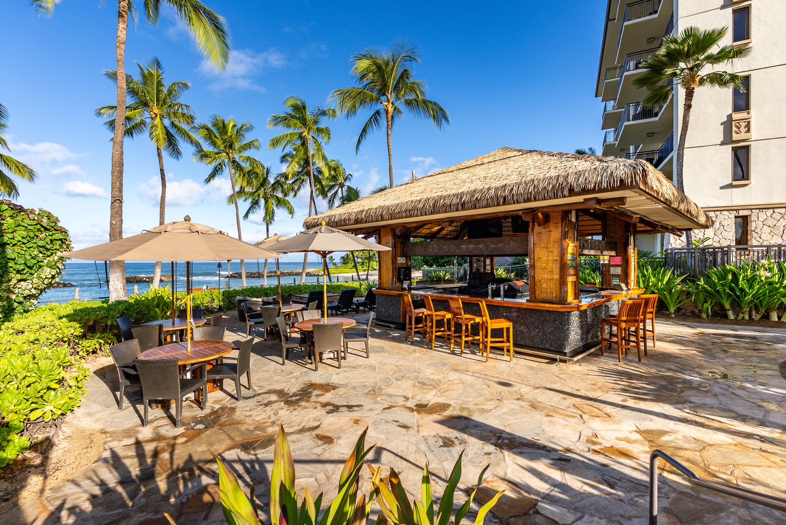 Grab a drink at the beachside bar without leaving the sand.
