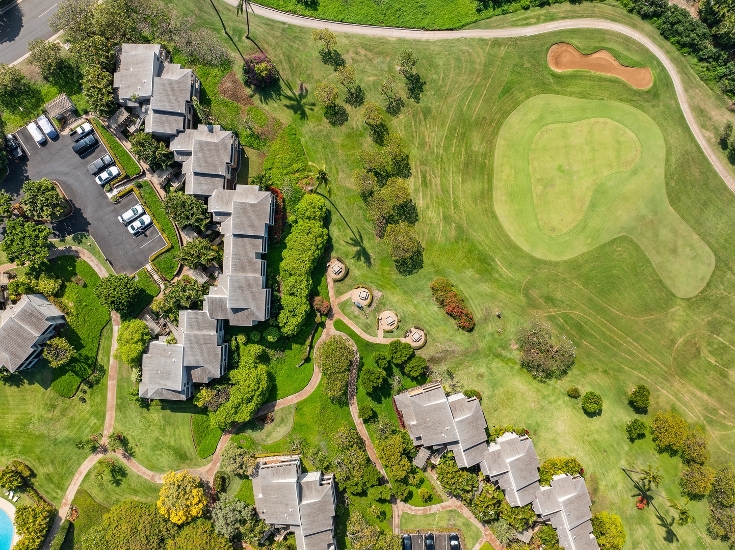 Kihei Vacation Rentals, Wailea Ekolu 1106 - Aerial view of Wailea Ekolu 1106 surrounded by lush fairways of Wailea’s championship golf course.