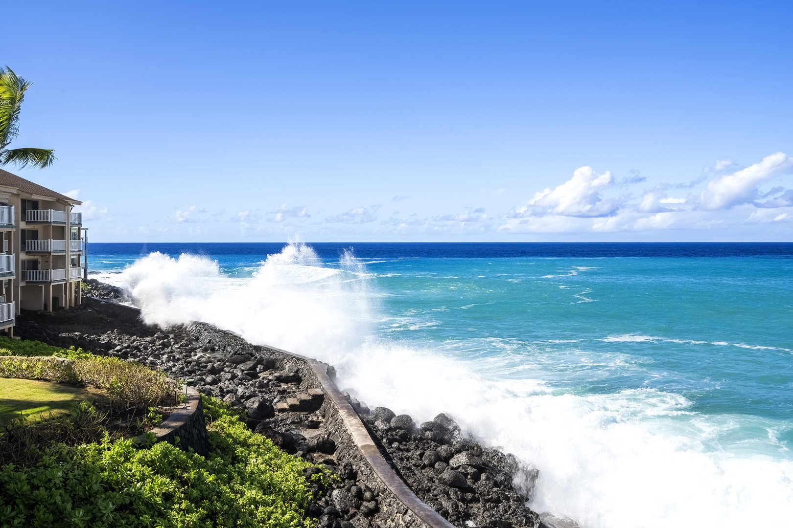 Kailua Kona Vacation Rentals, Sea Village 1105 - Ocean waves crashing ashore at the complex