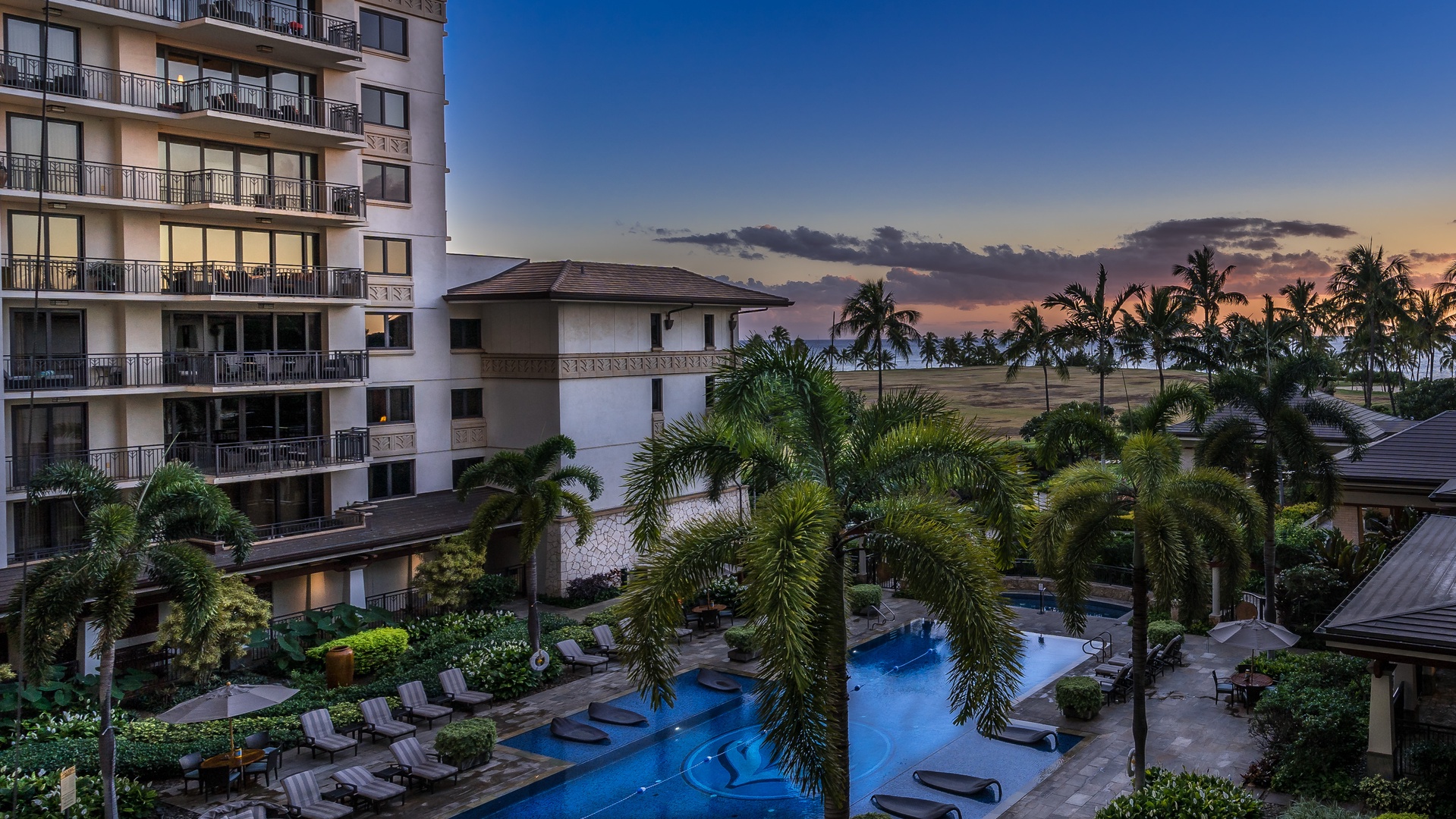 Kapolei Vacation Rentals, Ko Olina Beach Villas O401 - Sunset views of the resort from the lanai.