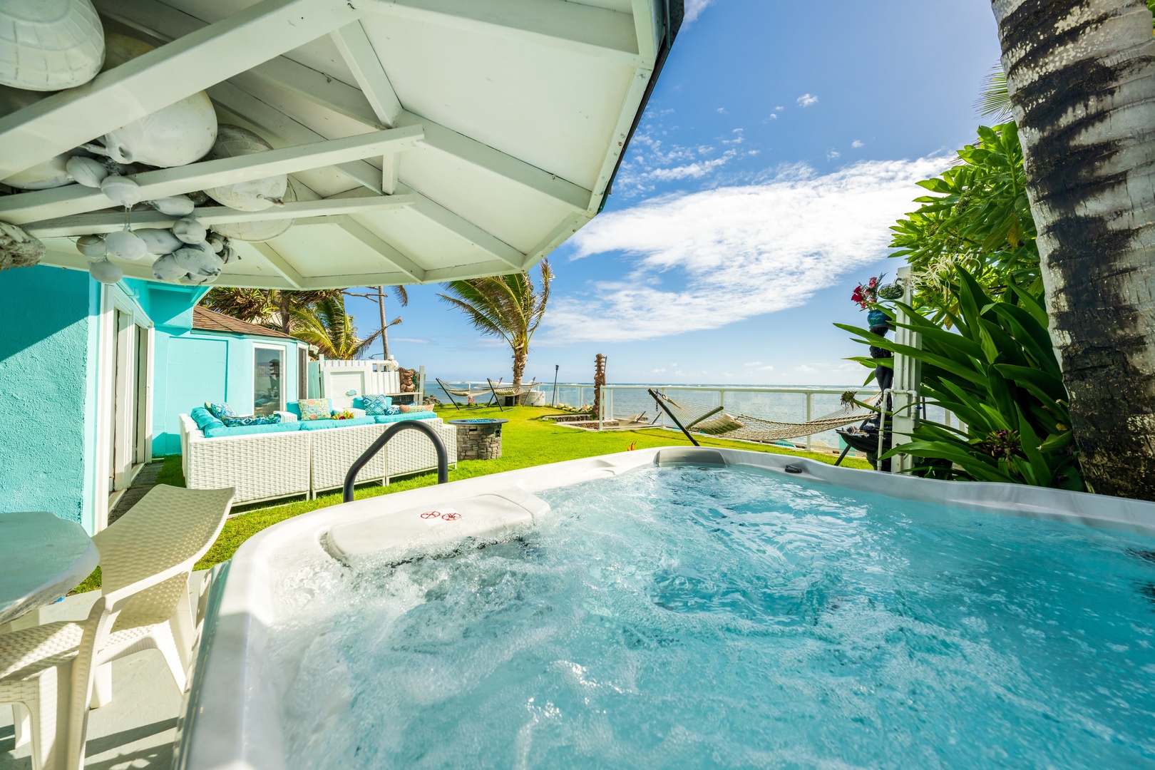 Hauula Vacation Rentals, Private Beach Paradise - A private hot tub set at the water's edge, warm enough to stay in long past sunset.