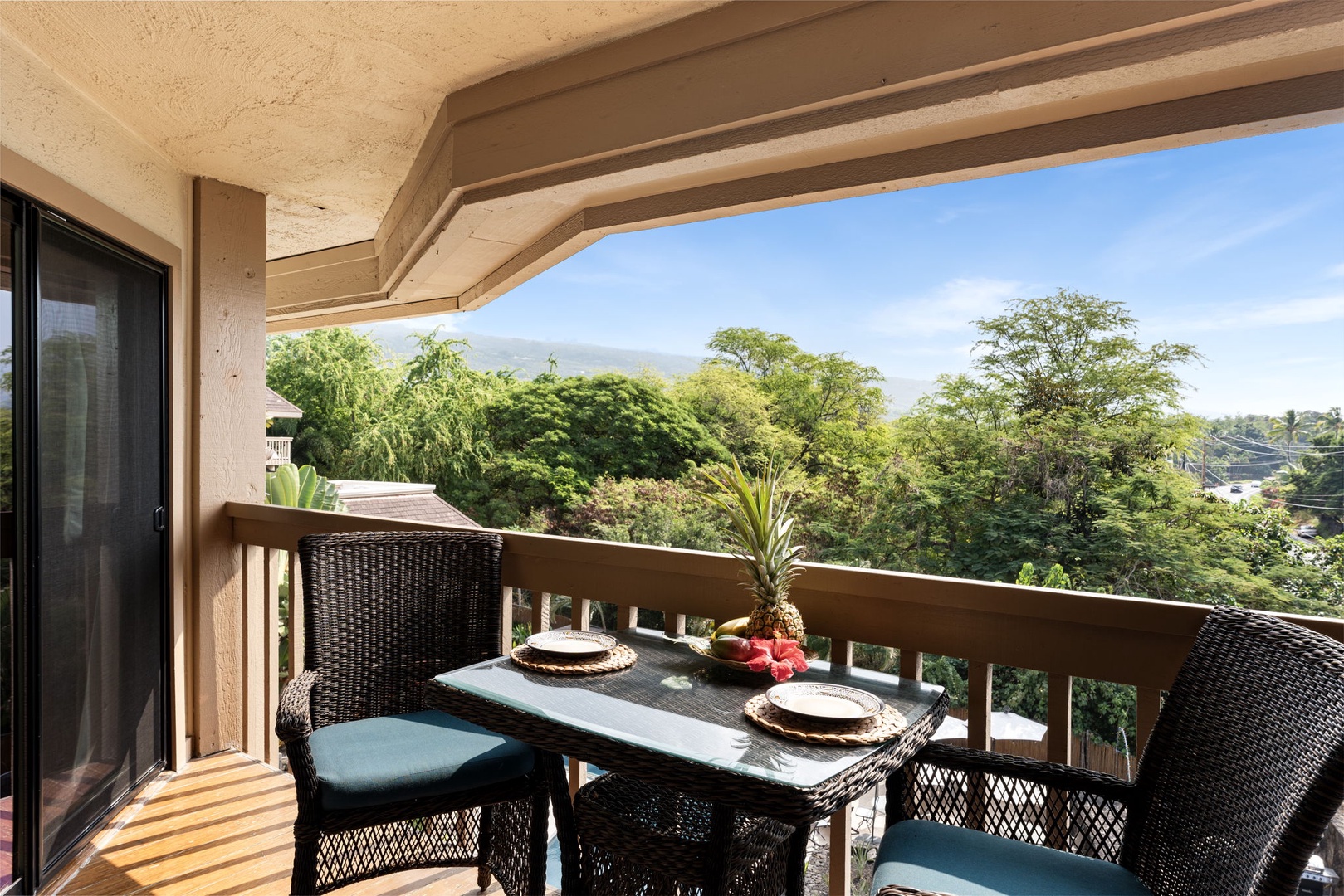 Kailua Kona Vacation Rentals, Royal Kahili 401A - Lanai with comfortable seating for two, offering serene views of the surrounding landscape.