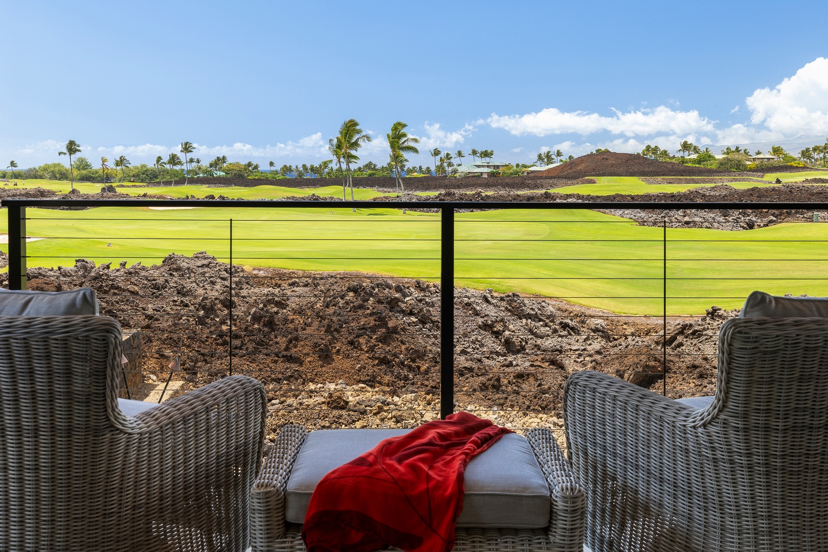 Kamuela Vacation Rentals, 6BD Mauna Lani Lux Golf Estate (5) at One Ocean - The view outside of the guest bedroom onto the lava-rock landscape and the fairway past it.