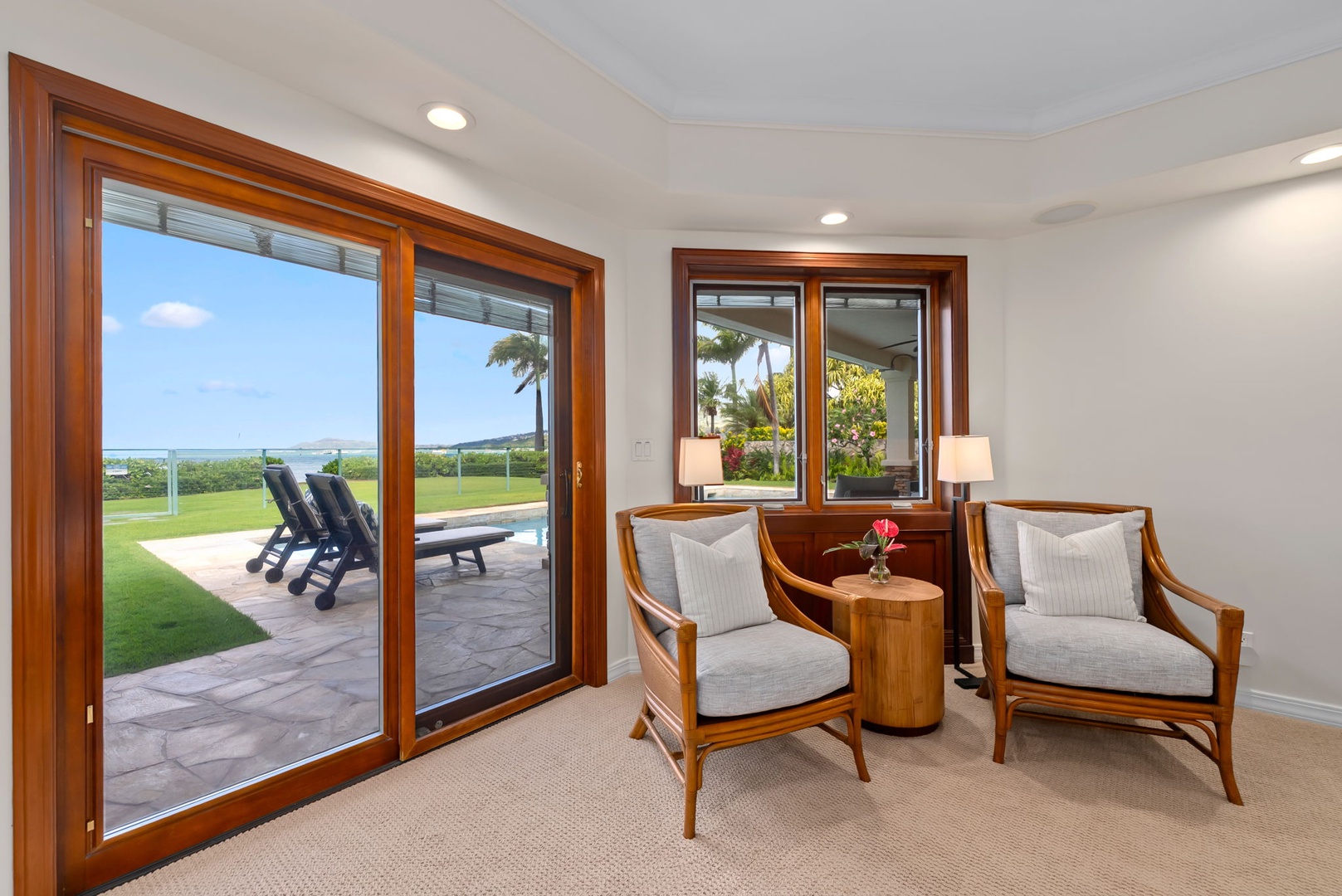 Honolulu Vacation Rentals, Maunalua Estate - A cozy seating nook invites quiet mornings with tropical breezes and sparkling water views.