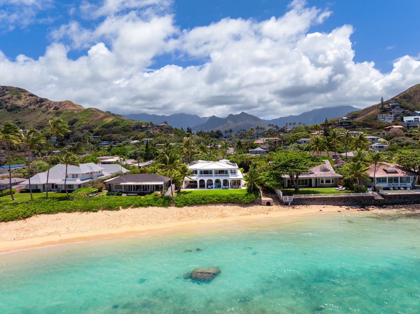 Kailua Vacation Rentals, Lanikai Sunrise Estate - Aerial perspective showcasing Mokulua Sunrise Estate’s rare beachfront position along Lanikai’s golden sands.