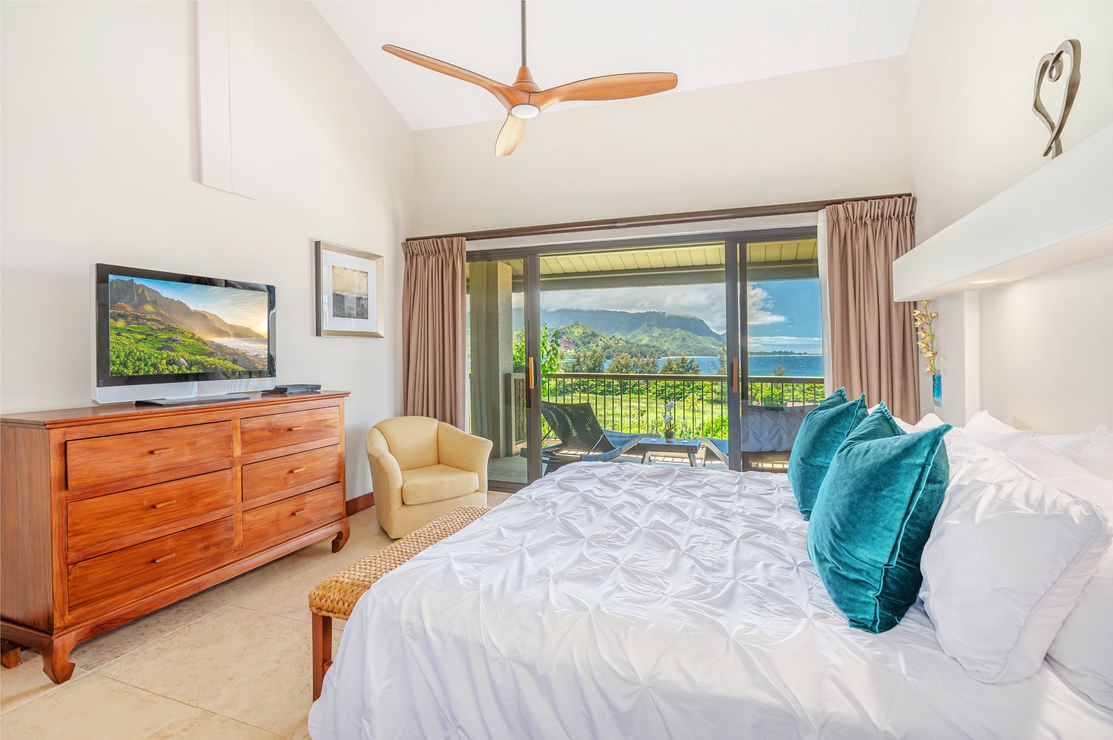 Princeville Vacation Rentals, Hanalei Bay Resort 7307 - Primary bedroom with flat screen TV and DVD player
