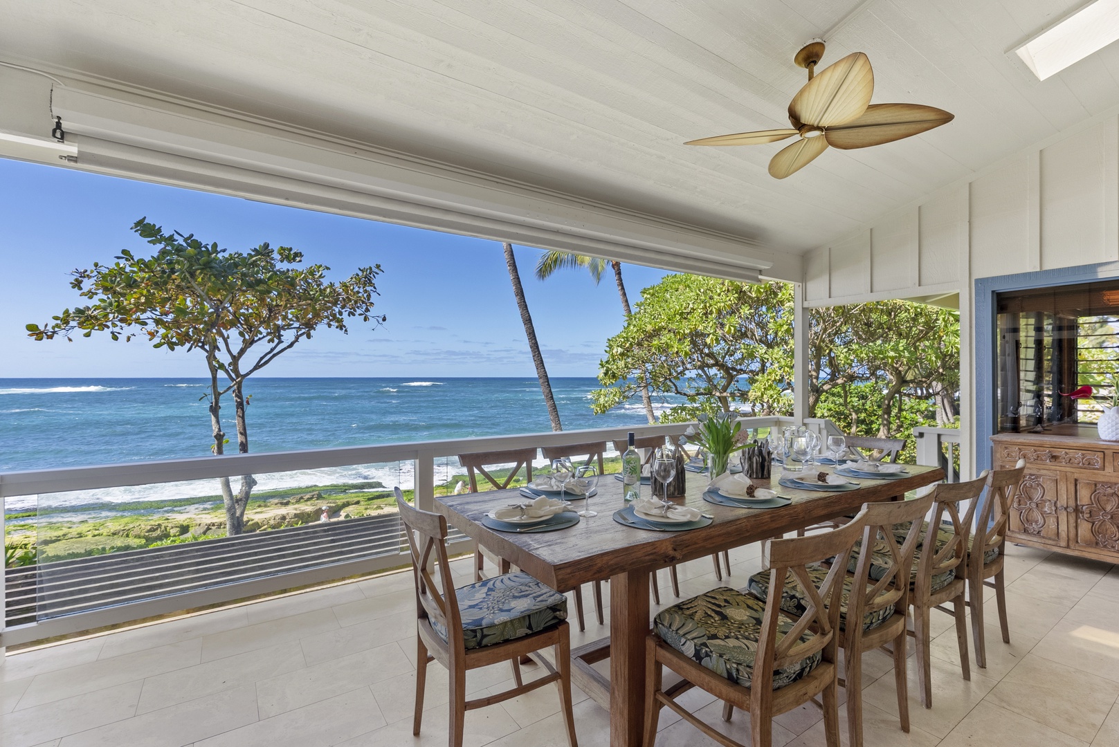 Haleiwa Vacation Rentals, Maluhia Beach House - Gather around the spacious dining table for ten, perfect for meals with a stunning ocean backdrop.